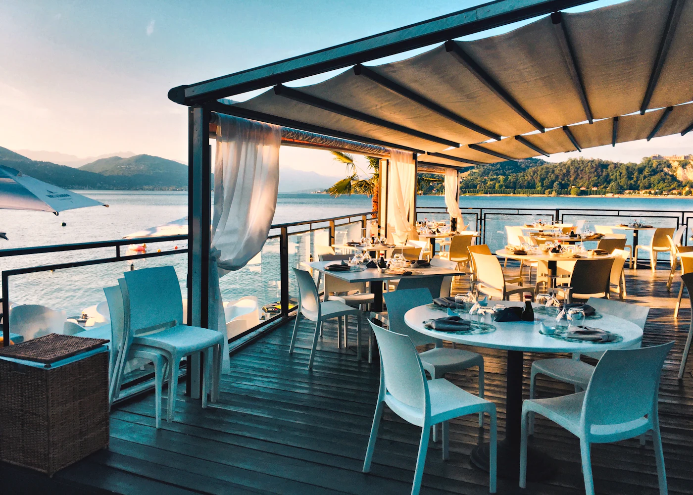 The Terrace at Uvendra, an open-air dining deck with set tables