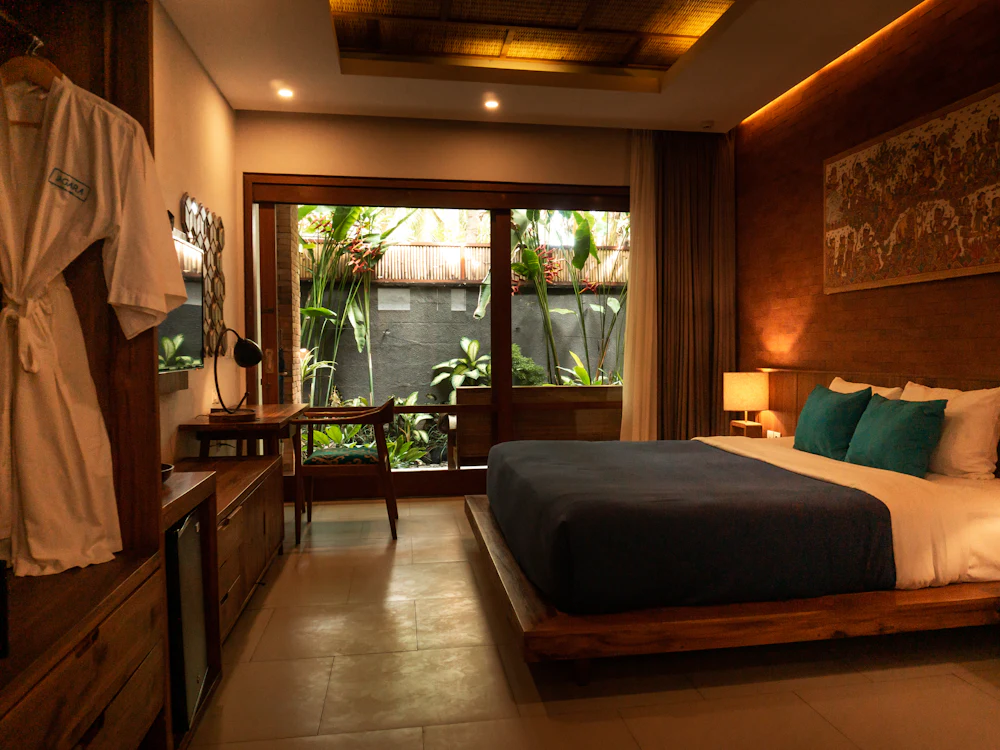 Uvendra guest room with neatly made bed