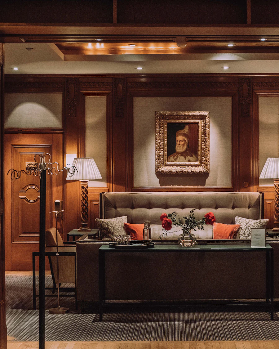 Uvendra lounge with timber panelling and warm lamps