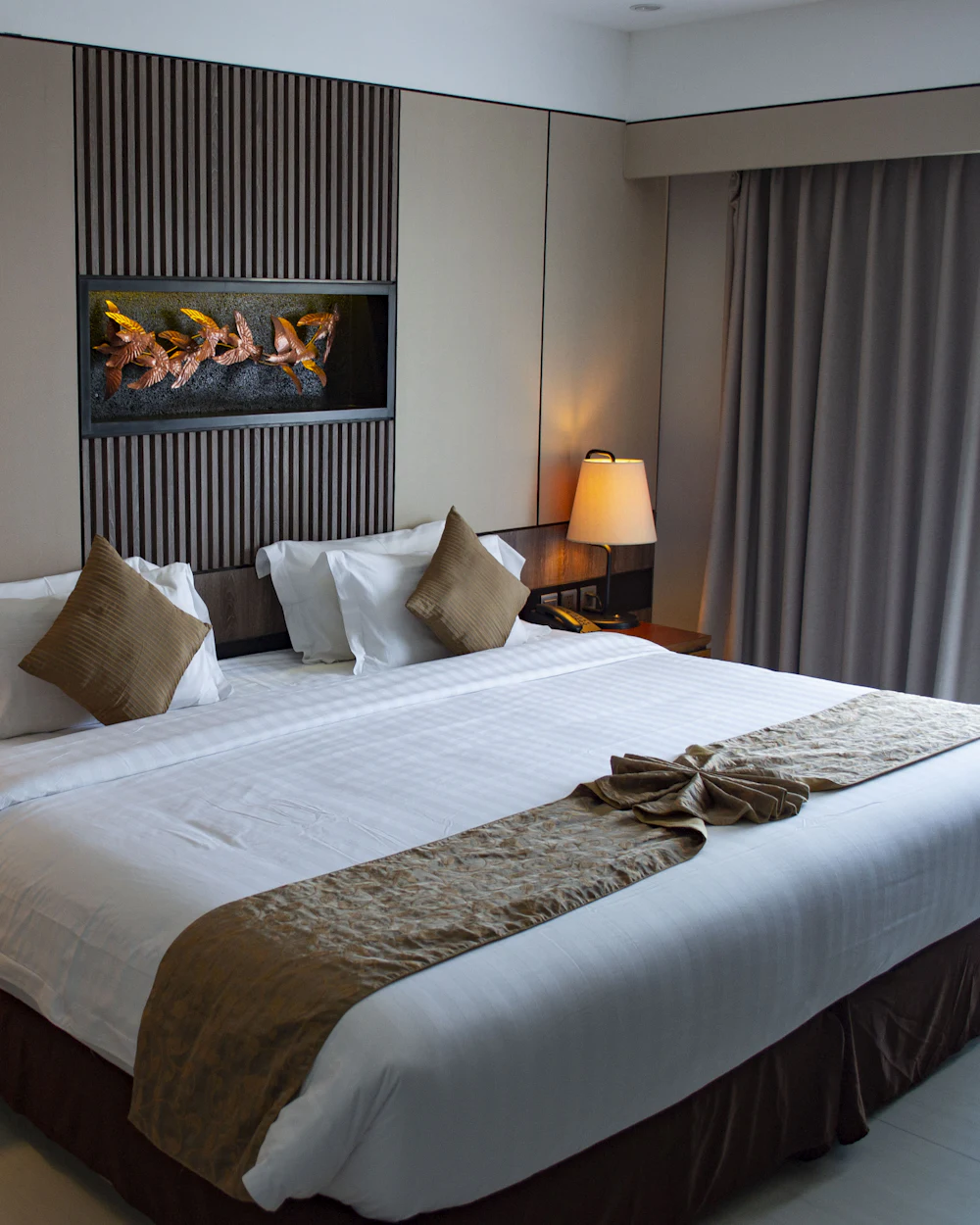 Uvendra Garden Suite bedroom with soft bedside lighting